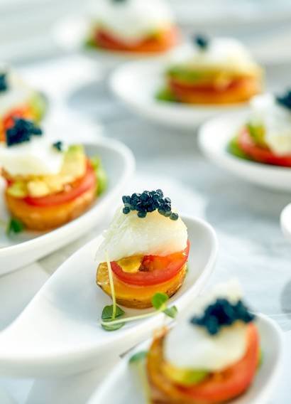 Delicious tartlets with black caviar. Concept of food, restaurant, catering, menu